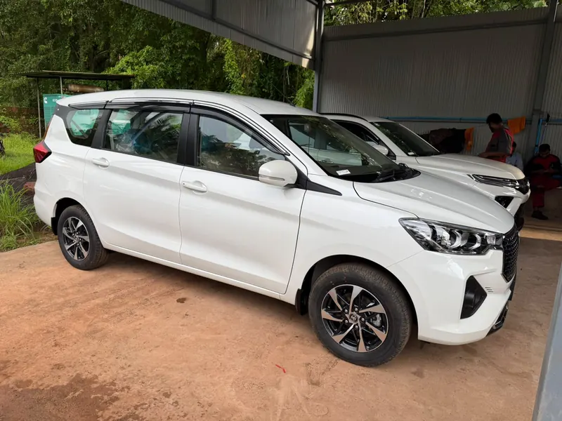 White Toyota Rumion 7 seater, available on rent with driver in Kankavli